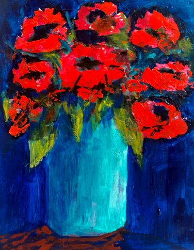 Poppies in aqua vase