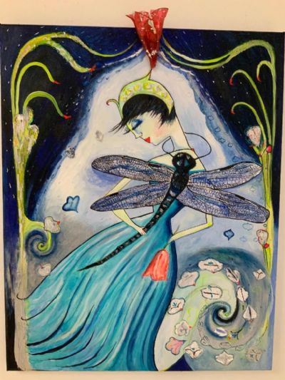 Girl holding a Dragonfly